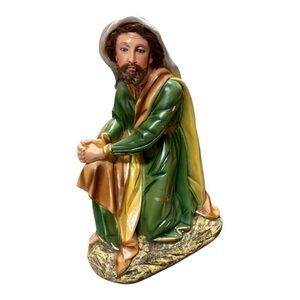 Beautiful statute vintage St. Joseph kneeling and praying.